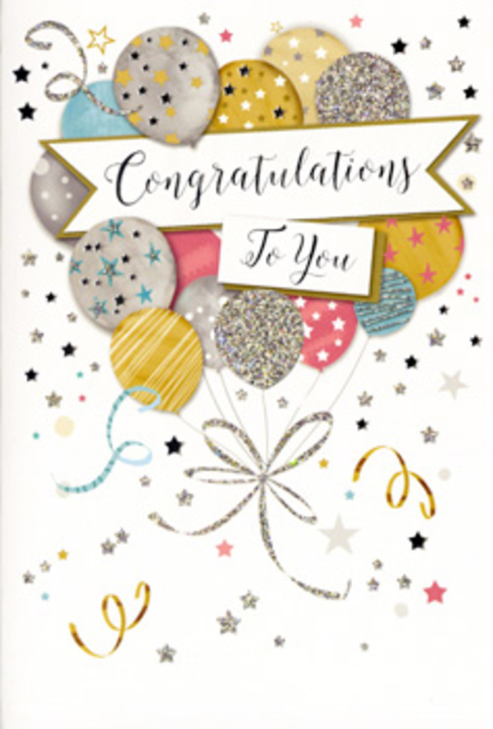 The photograph presents a tall congratulations card whose front is transformed into a gentle explosion of party imagery, refined yet unmistakably festive. At the centre is a bouquet-like spray of illustrated balloons, rising upwards as if just released. The balloons come in a harmonious selection of colours-champagne gold, muted silver, soft cream, sky blue, rosy pink, and pale grey-each one carefully shaded to suggest a rounded, three-dimensional form. Decorative patterns distinguish them: fine glittering stripes wrap some balloons, while others shimmer with all-over sparkle or are scattered with tiny, radiant star motifs. From the base of this balloon cluster, slender strings of gold and silver descend, twisting and looping with the same easy movement as curling ribbon fluttering along The Avenue in Highams Park on a breezy day. Across the midsection of the design, a lightly curved banner floats, edged with a hint of metallic sheen. On the banner, the phrase "Congratulations To You" appears in stylish calligraphy, flowing and balanced, giving the impression of care and intention behind every letter. The background remains soft and light, generously sprinkled with miniature metallic stars, dots of confetti, and whimsical swirls that mimic party streamers caught mid-spin. The printing looks semi-gloss, with raised glitter accents that likely feel textured beneath the fingertips, especially along the stars and patterned balloons. The card's atmosphere is one of polished happiness-perfect for pairing with a vase of fresh blooms sent to celebrate a new job, exam result, or special life event around Highams Park and Chingford. From a florist's viewpoint, it is an ideal complement to flowers, capturing the emotion of congratulations in a timeless, visually sparkling way.